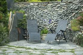 Check spelling or type a new query. The Ancient Art Of Stone Couple Creates Beautiful Rock Wall Art Installations Stone Wall Design Stone Wall Art Garden Wall Art