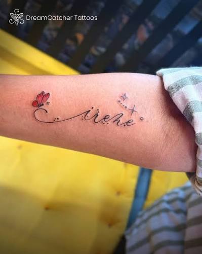 A beautifully crafted name in flowing script, accented with delicate stars and a soft red butterfly for a touch of charm. The elegant lettering adds grace and movement, while the subtle details