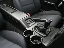 Center Console With Offset Cup Holders Much Better Than The Inline Ones Where You Have To Manuver Around To Shift