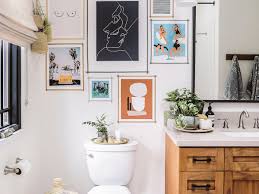 Transform your bathroom into the ultimate personal retreat. 15 Bathrooms With Beautiful Wall Decor That Will Inspire A Refresh