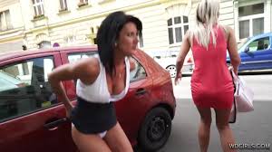 Happy and embarrassed milf pissing in the street - Porn GIF