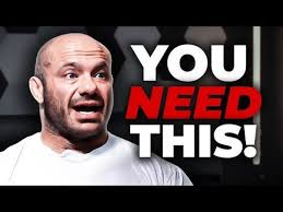 Dr. Mike claims tricep's long head is trained during back exercises despite  being a biarticular muscle