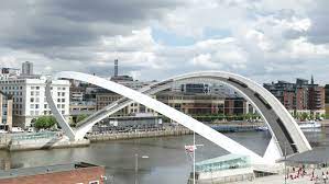 The bridge is essentially two graceful curves, one forming the deck and the other. Shutterstock