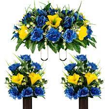 Whether you're looking for artificial flowers or artifical houseplants, there are plenty of stores dedicated to bringing you the best selection. Sympathy Silks Artificial Cemetery Flowers 2 Yellow Amaryllis Blue Rose Bouquets With Saddle Walmart Com Walmart Com