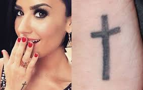 Demi Lovato's Tattoos & Meanings