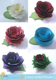 Take a video tour of the craft room >. Twirled Flowers Pazzles Craft Room Rolled Paper Flowers Paper Flowers Paper Flowers Diy