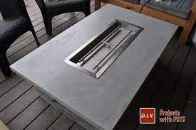 Create a box frame from the wood pieces then place bricks on it to serve as the fire pit table. How To Make An Outdoor Gas Fireplace With Diy Pete