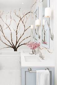 The natural stone countertop is just a little grayer than the white vanity, which makes a nice transition between the tile wall and the rest of the space. 15 White Bathroom Ideas Decorating White Bathrooms