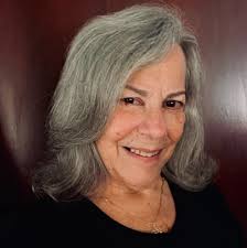 Do you see the man running towards or away?