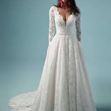 Lotus is a whimsical fairytale gown with cascading satin ruffles and ball gown tulle skirt. 44 Wedding Dresses With Pockets