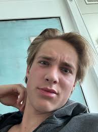 Why is this man sitting