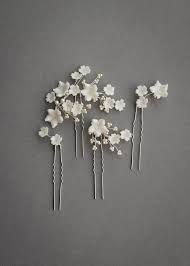 White magnolia flower hair clips. Delicate Bridal Hair Pins For The Modern Bride Tania Maras Bespoke Wedding Headpieces Wedding Veils