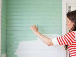 Tile decals such as gypsy yaya did above. How To Cover An Old Tile Backsplash With Beadboard Hgtv