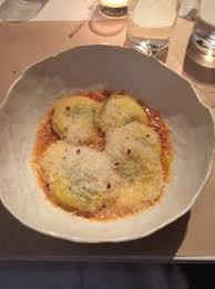 housemade ricotta ravioli with herbs