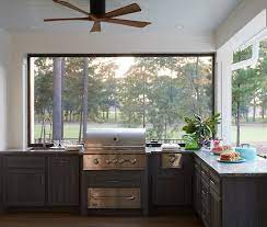 The vaulted shiplap ceiling in this kitchen makes a grand impression. Gray Shiplap Outdoor Kitchen Cabinets Design Ideas