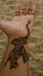 See why henna is becoming more popular than tattoos this back piece is an obvious example that henna tattoo designs are perfect for men too. 51 Cute And Impressive Elephant Henna Tattoo Ideas Tattoos At Repinned Net