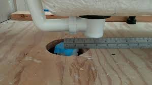It would be most accessible to install and service about 2 feet from the tub. Easiest Fastest Way To Move Bathtub Drain By 3 Inches Doityourself Com Community Forums