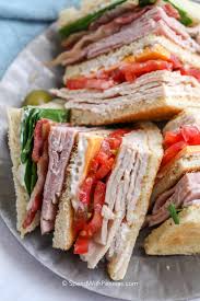 Wafer thin ham and swiss cheese on rye bread. Club Sandwich Spend With Pennies