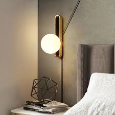 Mid Century Modern Orb Wall Light Cream White Glass Single Light Mini Wall Mount Lighting In Brass Beautifulhalo Com