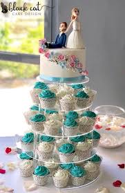 These wedding cakes were all custom designed and decorated. Blue And White Cupcake Tower Wedding Black Cat Cake Design Facebook