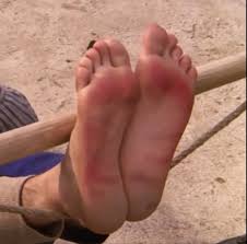 Foot punishment- nice guy under falaka