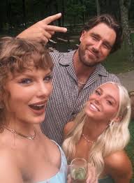 Travis Kelce and Taylor Swift attending a family wedding and posing with  fans. 💘