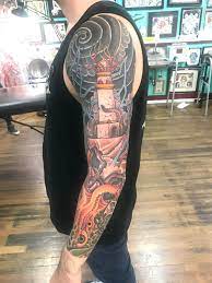 The lighthouse was another natural tattoo for sailors to get. Kraken Lighthouse Sleeve By Brian Thurow Dedication Tattoo In Denver Co Tattoos
