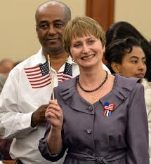 57 people become American citizens