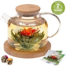 Allow a few minutes for the flower to bloom and infuse the water with green tea. How To Make Flowering Tea Balls