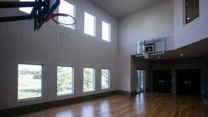 Inspiration for a traditional living room in moscow. Remodel Tour Features Home For Ultimate Basketball Fan