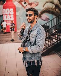 Black Jeans And Blue Denim Jacket Blue Denim Jacket Black Jeans And Black Round Frames Cool Sunglasses Black Denim Jacket Outfit Denim Jacket Black Jeans