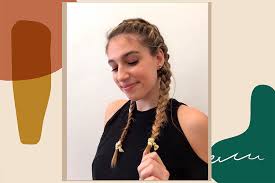 Split a section of your hair to two sides. How To French Braid Your Own Hair Diy French Braid Tutorial Hellogiggles