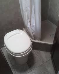 When not being used, it stows slightly tucked under the cabinet to provide more floor space. The Ultimate Guide To Your Rv Shower Rvshare Com