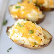 Double Stuffed Potato Topped With Cheese On White Plate Best Twice Baked Potatoes Easy Twice Baked Potatoes Twice Baked Potatoes
