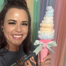 Who can recommend an affordable photographer for a first birthday session?