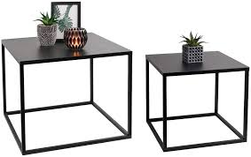 Stick with minimal designs in iconic shapes, or try a sculptural or graphic contemporary coffee table for an eclectic or artistic vibe. Lifa Living Black Coffee Tables Set Of 2 Low Stackable Side Tables Modern Design Metal Cubic Shape Living Room Tables Amazon De Home Kitchen