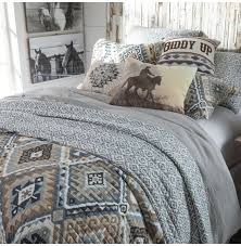 This bedspread is accented with multiple floral patterns all over the bedspread in various olive greens, dark blue, grey, tan and white shades in this modern yet bohemian spades quilted coverlet bedspread set sold exclusively by tache home fashion. Welcome To The Diamond Arrow Southwest Quilted Bedding Collection Customization Page
