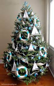 This year is the first year we've had a flocked christmas tree. 17 Coastal Christmas Decor Ideas