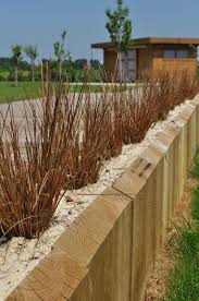 Jolie Bordure En Bois Fleures Bordure Bois Amenagement Exterieur Bordure Bois Bois Bordures