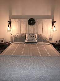 We Love Our Cozy Farmhouse Inspired Bedroom We Used A Refurbished 5 Panel Door As The Headboard With Ha Remodel Bedroom Headboard From Old Door Bedroom Design