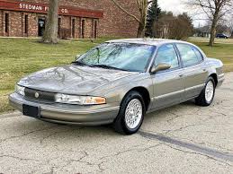 Image result for Medium Driftwood 1995 Chrysler
