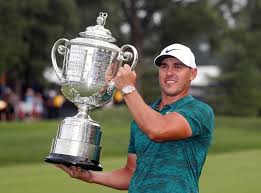Brooks koepka held off challenges from tiger woods and adam scott to take the us pga title as huge crowds at bellerive cheered tiger through a rollercoaster final round. Pga Championship Brooks Koepka Holds Off Charging Tiger Woods To Win Third Major And Make Golf History The Independent The Independent