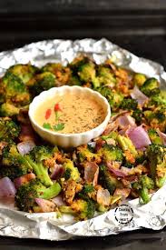 Crispy Garlic Roasted Broccoli Low Calorie Broccoli Roast Cooking From Heart Recipe Garlic Roasted Broccoli Broccoli Roasted Broccoli Recipe