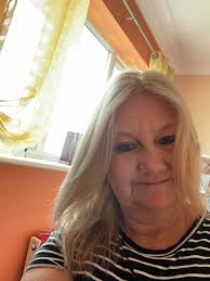 Going grey at 65, keep or color?