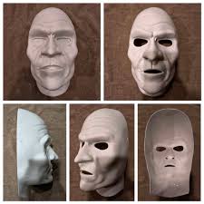 Jan Yamauchi's 21 masks feature ties made from double-knit strips. She  keeps experimenting with the Olson masks for the best fit and comfort  around the ears.