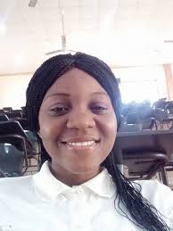 Melanin-rich Dinka girl shines with her radiant complexion. She has a  pretty dark skin that shines naturally and looks very attractive because of  its richness. www.theafricanhistory.com