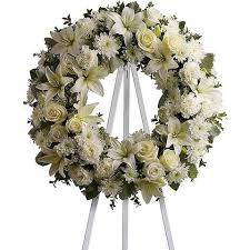 White roses with caspia arranged on a box stand with white tile fabric. Karangan Bunga Duka Cita Png Toko Bunga Online
