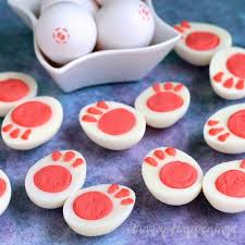 Arrange the vegetables and chips around the bunny. Deviled Egg Bunny Feet A Fun Easter Appetizer