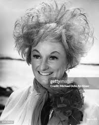 Peter Christopher runs with Greta Patterson , his new "buisness deal...  News Photo