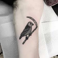 The scapula is an versatile area when it comes to getting a tattoo, both small and large. Bird On A Scythe By Deborah Pow Tattoogrid Net